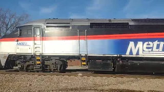 Metra Train going Inbound up close passing the Spaulding Junction, IL on a Cool Day.