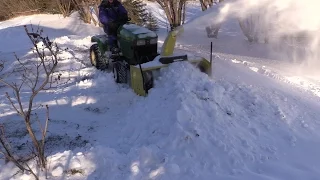 Insane John Deere 425 Snowblowing Power!