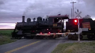 Vintage steam train passes through newly upgraded crossing