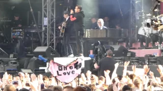 One love Manchester Robbie Williams Manchester we're strong