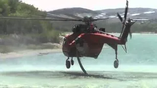 The Sikorsky S-64 Skycrane picking up water at Powerhouse Fi