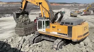 Liebherr 974 Excavator Loading Mercedes And MAN Trucks