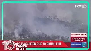 WATCH: Brush fire scorching through Florida neighborhood, prompting evacuations