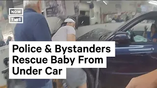 Baby Freed After Getting Trapped Under Car