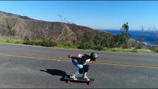 Downhill skateboarding in Malibu