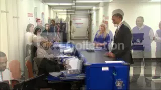 OBAMA CASTS EARLY BALLOT- SHOWS ID (FUNNY)