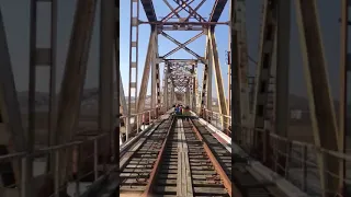 Russian diplomats push rail trolley across border to leave North Korea