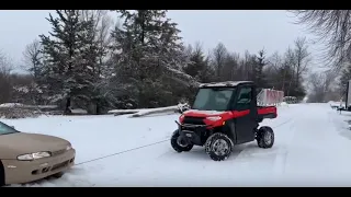 2019 POLARIS RANGER PULLS CAR OUT OF SNOW