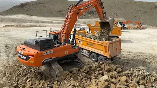 DEVELON DX530LC Excavator Trucks Loading