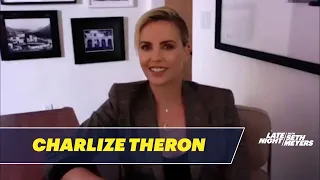 Charlize Theron and Seth Exchange Stories About Drinking with Rihanna