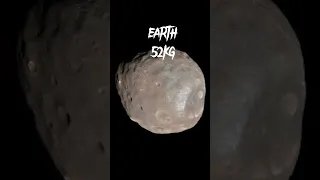 how much an average person can lift in earth vs phobos