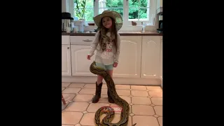 Little girl and her snake