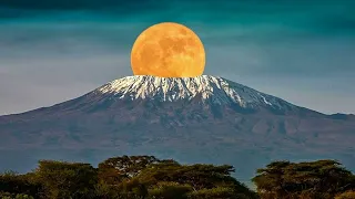 Вулкан  Килиманджаро мировой рекордсмен по числу высотных климатических зон. Горы мира.