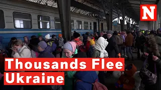 Thousands Fleeing Ukraine Overwhelm Lviv Train Station, Some Arrive In Poland