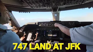 Cockpit view of BOEING 747-400 LAND at KJFK (Kennedy Airport). low flight over the clouds