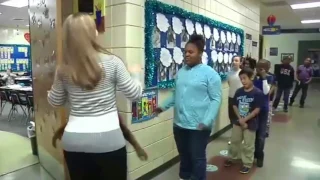 Jerusha Willenborg:3rd Grade Teacher does Unique handshakes with students