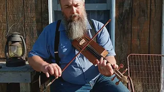 "The Repentance Of Job"  written by me on homemade cigar box fiddle