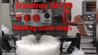 D'andrea TA 120 making some POM chips.  Antispin system working great on the boring head. INTOS