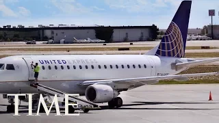 A Woman Screaming 'I Am God' Tried To Open A Plane Door During United Airlines Flight | TIME