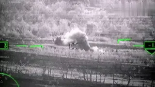 Russia army destroying a Ukrainian armored personnel carrier with a Vikhr guided anti-tank missile