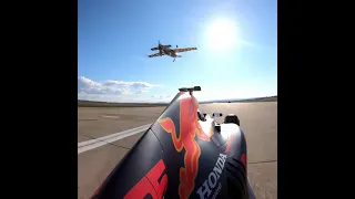 Amazing Skill: Inverted Red Bull Race plane vs Red Bull F1 car