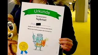 Tapferkeits-Urkunde für Corona-Impfung. "Alle Kinder" impfen, weil es wirkt..., wie Lauterbach sagt.