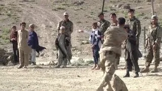 US Soldiers Play Cricket With Local Residents in Afghanistan