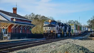 NS: A short intermodal train passing by the AMTRAK station