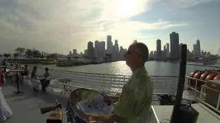 Spanish eyes - performing steel drum music on a boat in Chicago by Navy Pier