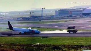 WATCH: Boeing 767 makes emergency landing after gear failure