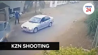 WATCH | Dogs snap at man firing shots at vehicle outside Durban home