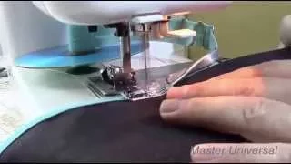 Швейная машина Janome. Приспособление для окантовки срезов ткани косой бейкой.