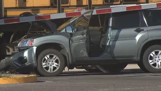 Woman speaks on helping driver out of SUV that hit moving train