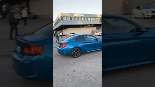 Bmw M2 leaving car meet