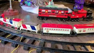 Christmas tree and train layout and looking for ideas with railroad light shield.