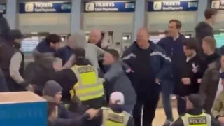 Millwall and Portsmouth fans bump into each other at Waterloo Station
