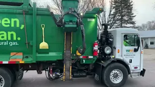 Waste Management peterbuilt ZR picking up a bin and driving off (the driver honked at me)