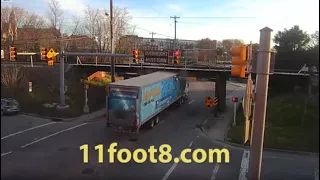 Speeding semi gets smashed up at the 11foot8 bridge