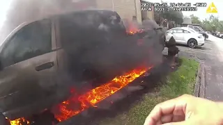 Texas police officers rescue man from burning car: Body camera video