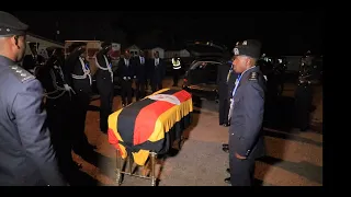 Somber mood as Keith Muhakanizi body arrives at Entebbe International Airport, received by family