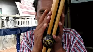 Khaen master Sombat Simlah playing Lam Poen