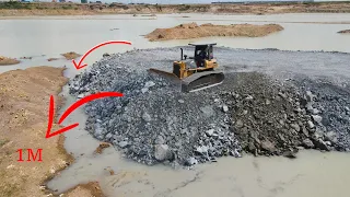 Nice Operator Bulldozer Pushing Rock into Water with Dump Truck Transport Rock Building New Road