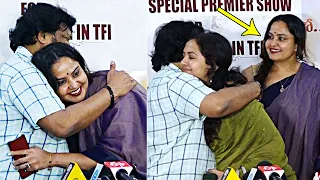 Actress Pragathi And Singer Sunitha HUGS Director Krishna Vamsi @ Rangamarthanda Movie Premieres