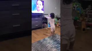 Daneliya Tuleshova  1and half year old big fan trying to sing to her song