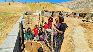 Rural family.  Children help adults in construction during the New Year holidays