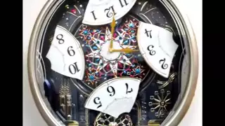 QXM239SRH - Seiko Melodies in Motion Carnival Celebration & Fireworks Animated Musical Clock