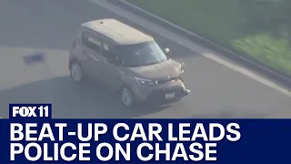 Beat-up car leads high-speed police chase