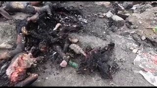 Жуткое видео ужасных военных преступлений россии в Буче: сожженные тела замученных украинцев