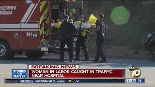 Woman in labor caught in traffic near hospital on lockdown