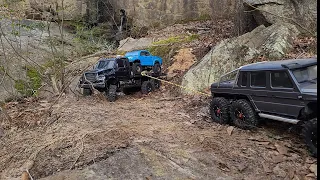 Traxxas TRX-6 Ultimate RC Hauler on extreme trails and loaded with the tacoma